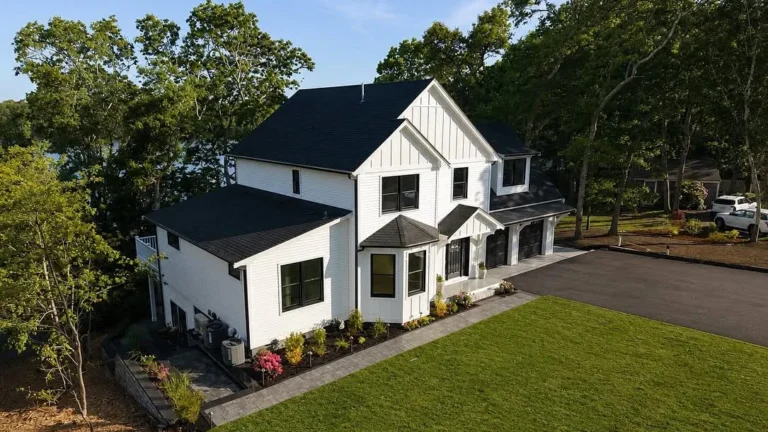 Aerial view of a new construction home on Cape Cod with HVAC system by High Flow HVAC