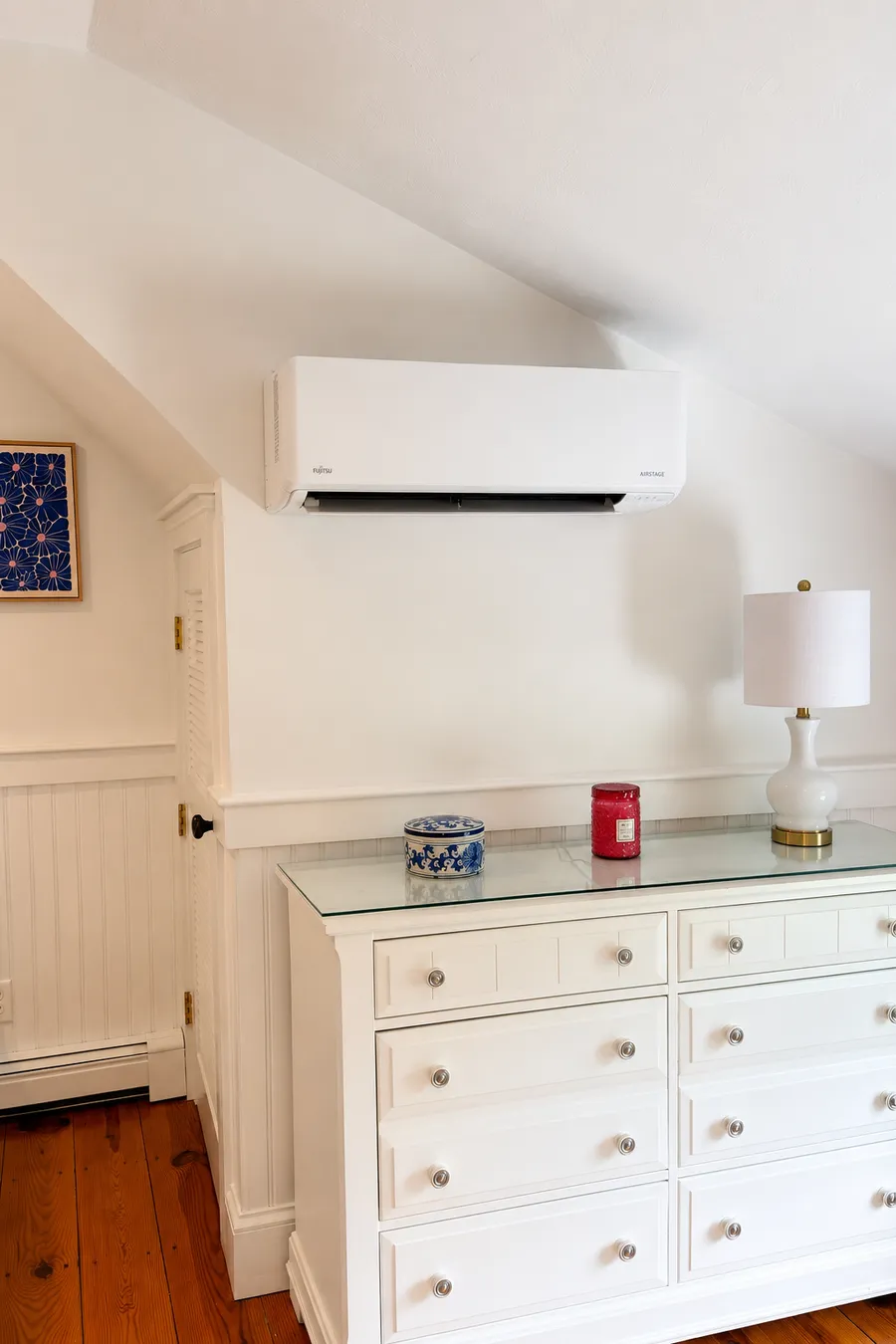 Fujitsu Airstage ductless mini-split installed in a Cape Cod bedroom with sloped ceiling